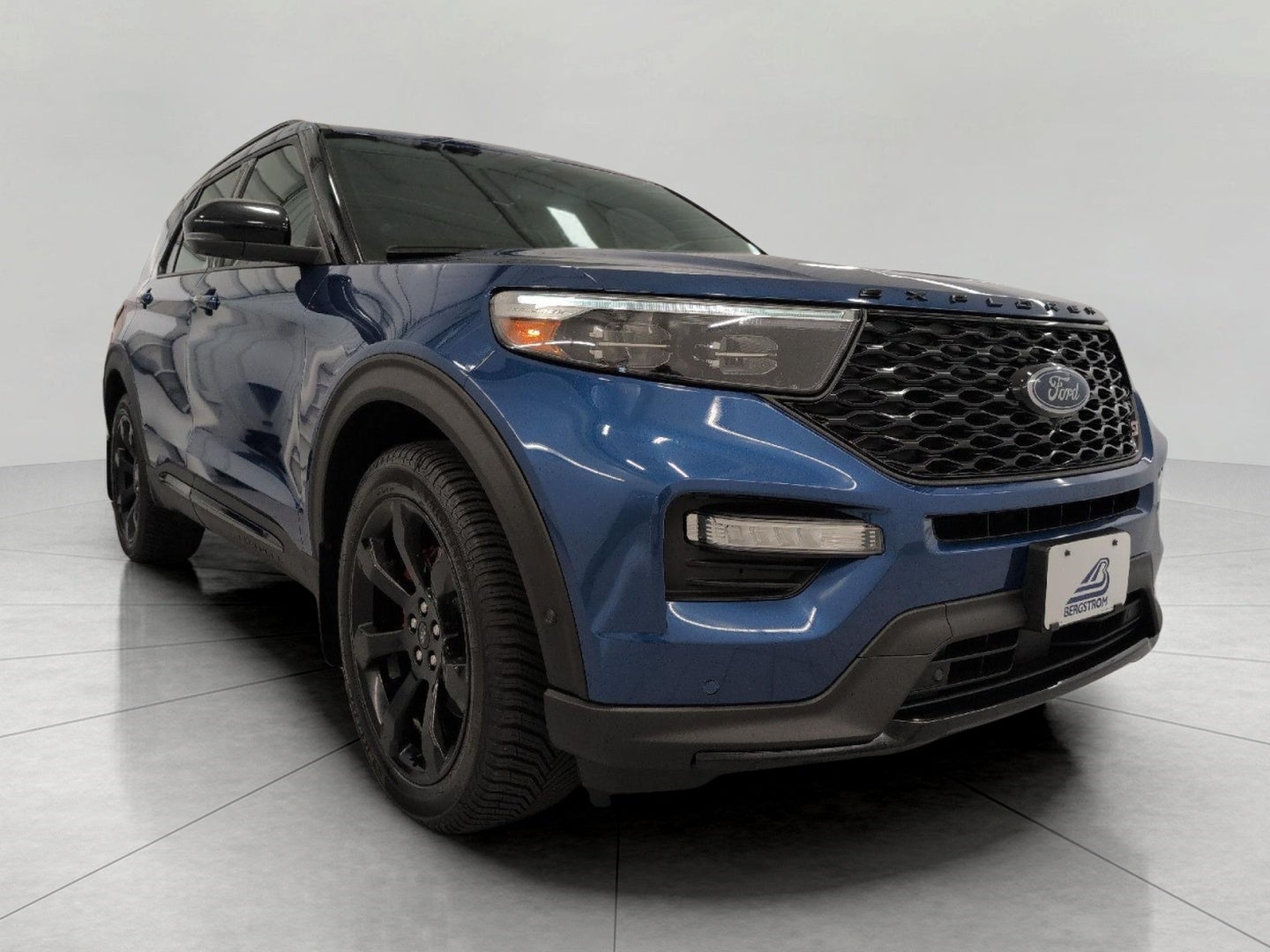 2020 Ford Explorer ST 4WD in Atlas Blue Metallic — front three-quarter view