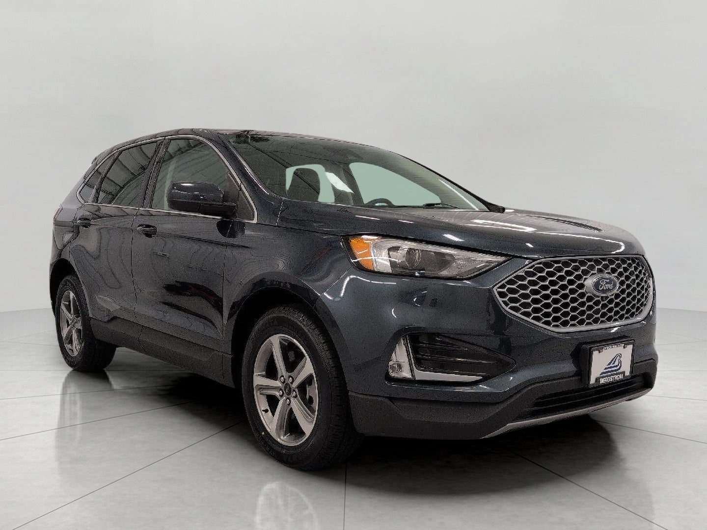 2024 Ford Edge SEL AWD in Stone Blue Metallic — front three-quarter view