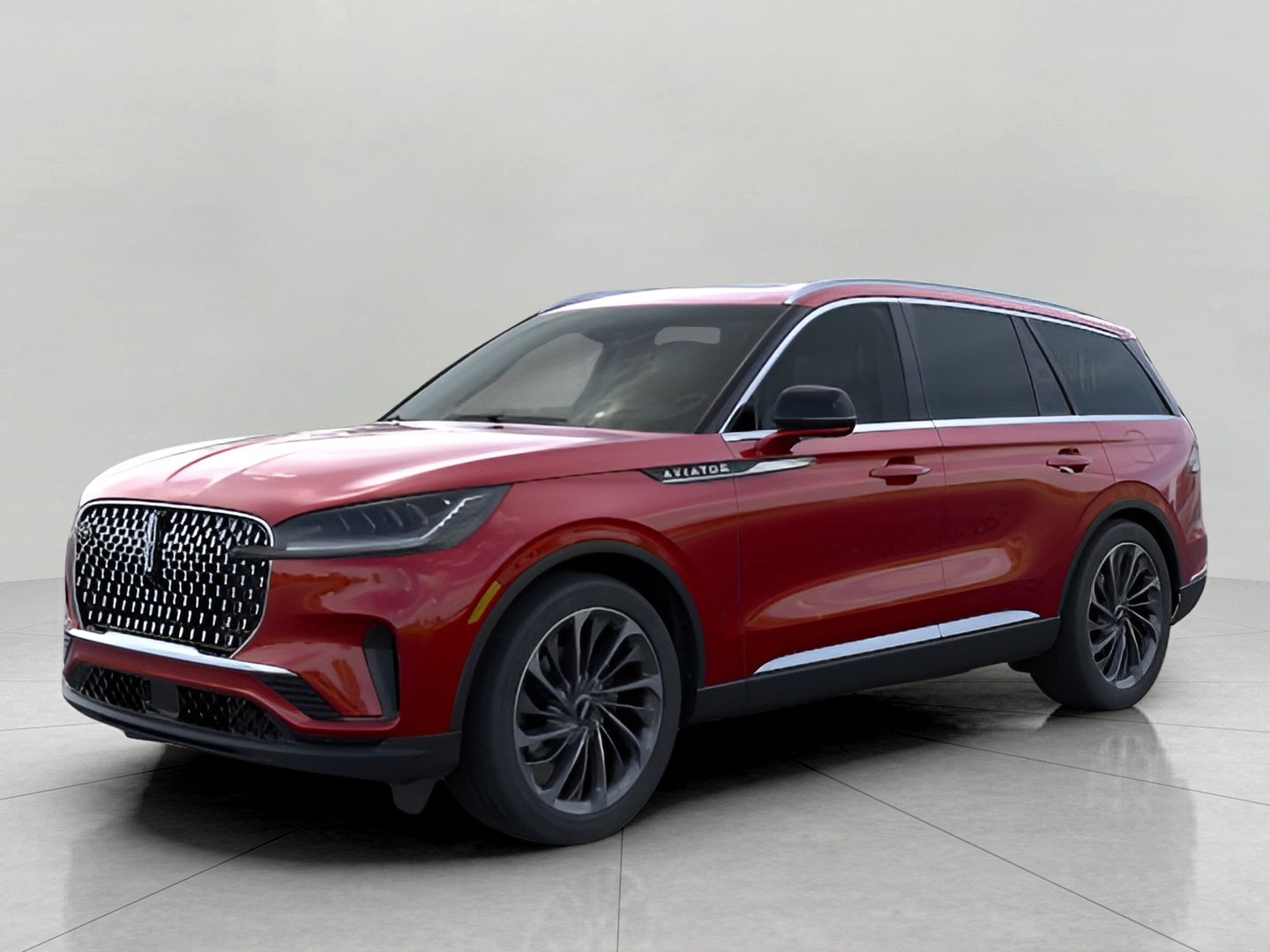 2026 Lincoln Aviator Reserve AWD in Red Carpet Metallic Tinted Clearcoat — front three-quarter view