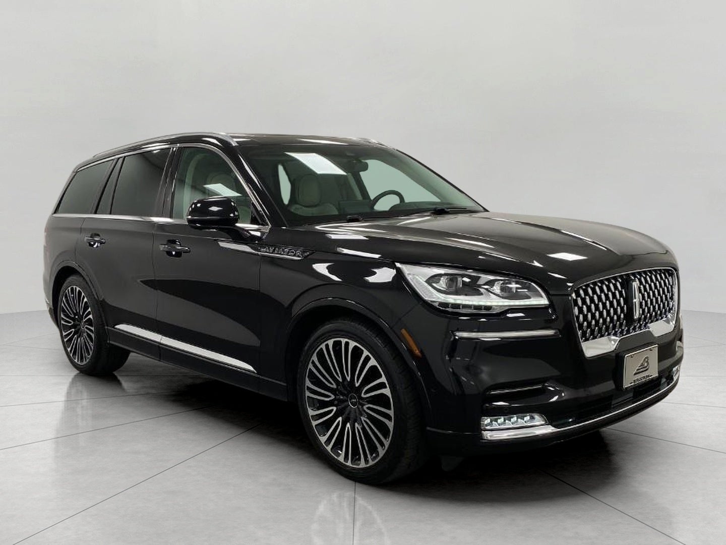 2023 Lincoln Aviator Black Label AWD in Infinite Black Metallic Clearcoat — front three-quarter view
